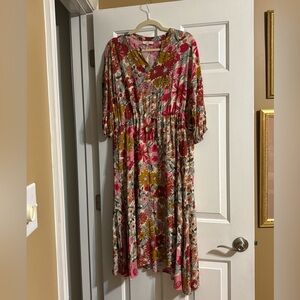 Boutique item: three-quarter sleeve dress.